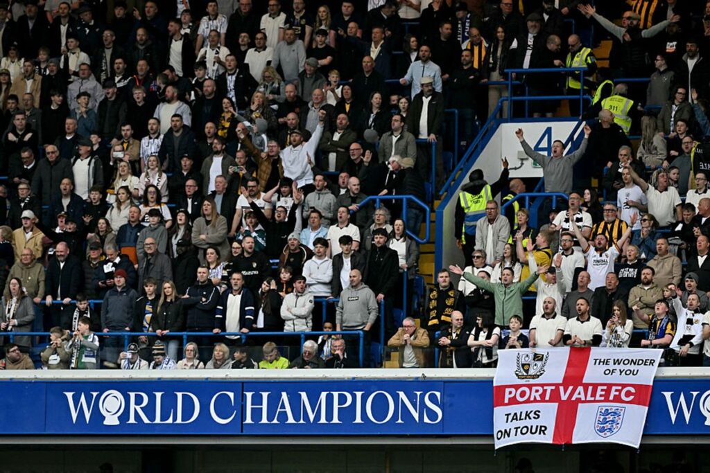 Port Vale fans sing during the English FA Cup quarter final football match against Chelsea.