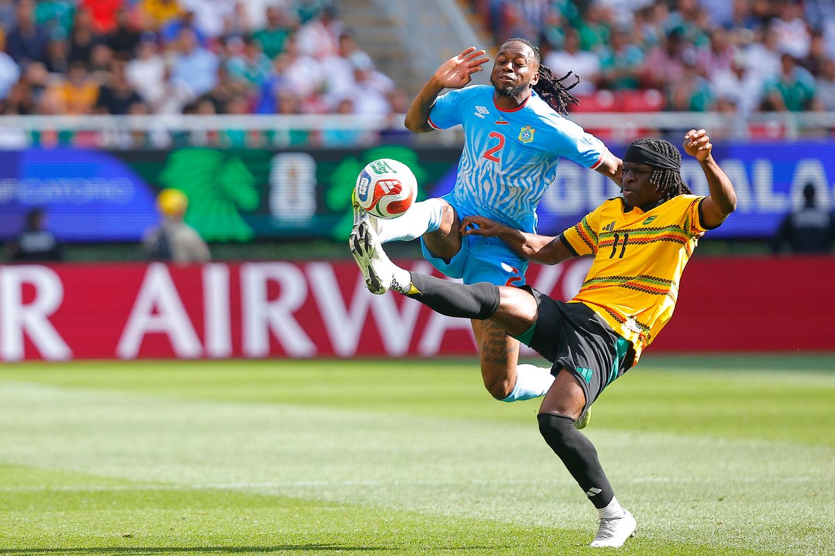 Aaron Wan-Bissaka (L) of Congo DR and Tyreece Campbell (R) of Jamaica 