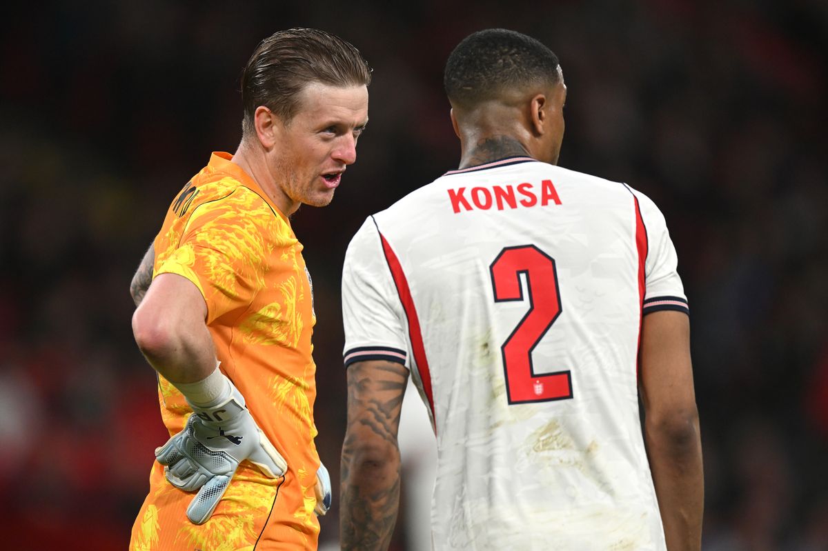 Jordan Pickford and Ezrie Konsa during England's defeat to Japan