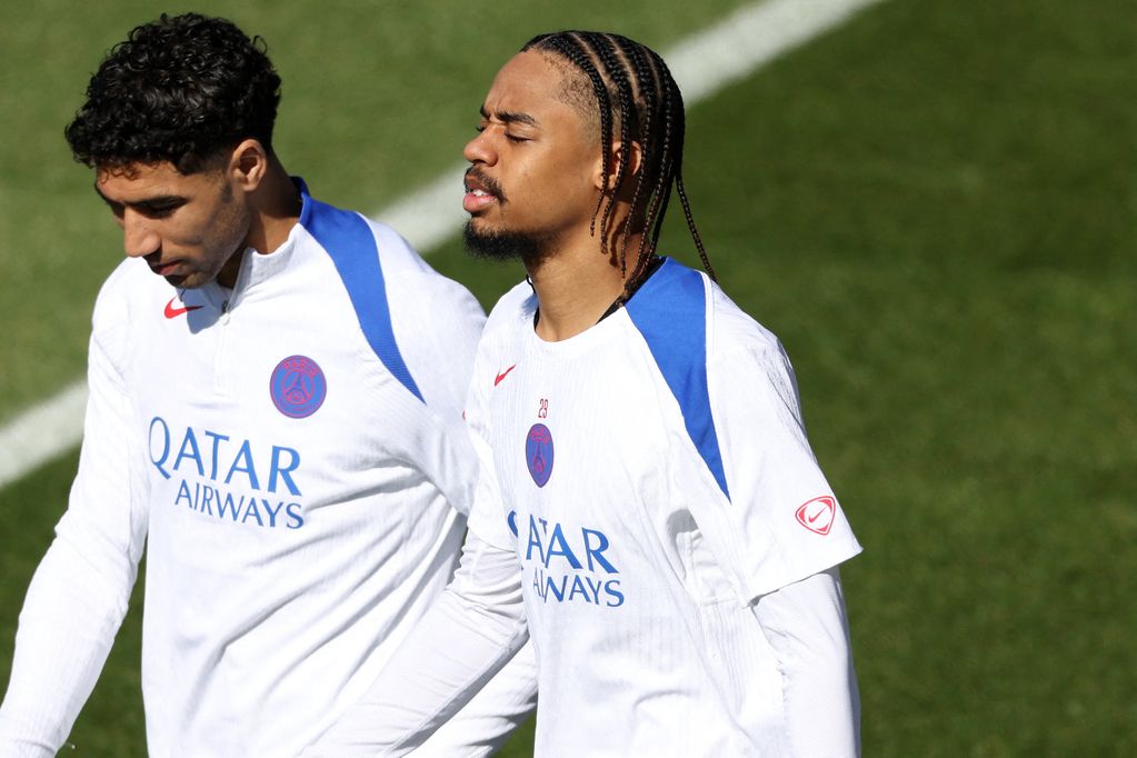 Paris Saint-Germain's Moroccan defender #02 Achraf Hakimi (L) and Paris Saint-Germain's French forward #29 Bradley Barcola arrives for a training session at the Campus Paris Saint-Germain in Poissy, on the western outskirts of Paris on April 7, 2026, on the eve of the UEFA Champions League quarter-final first leg football match against Liverpool F.C. (Photo by FRANCK FIFE / AFP via Getty Images)