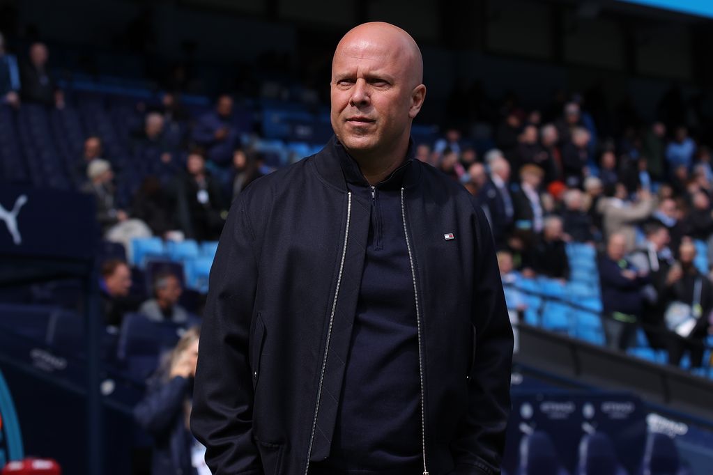 Arne Slot watches on at the Etihad Stadium