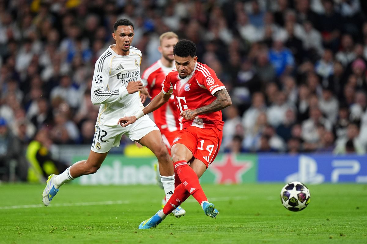Luis Diaz of FC Bayern Munich scores his team's first goal during the UEFA Champions League 2025/26 Quarter-Final First Leg match between Real Madrid CF and FC Bayern München at Estadio Santiago Bernabeu on April 07, 2026 in Madrid, Spain
