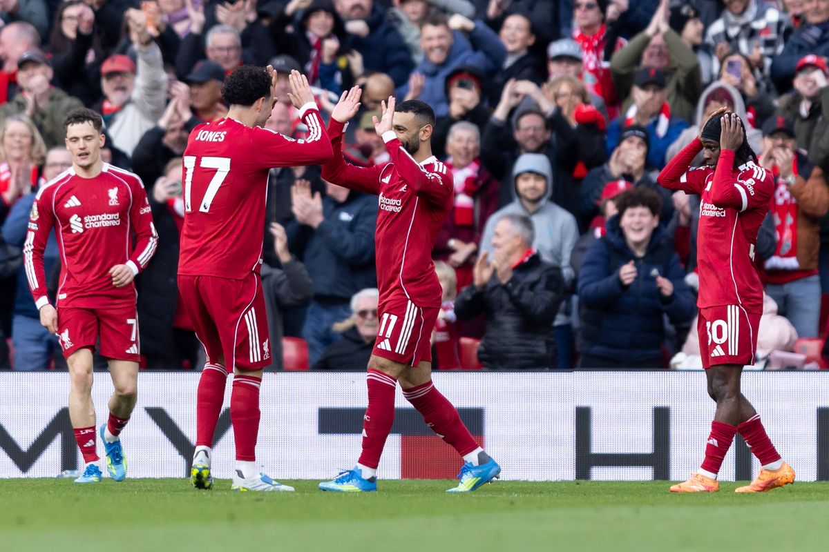 LIVERPOOL, ENGLAND - APRIL 11: Mohamed Salah of Liverpool celebrates with teammate Curtis Jones of Liverpool after scoring his side's second goal during the Premier League match between Liverpool and Fulham at Anfield on April 11, 2026 in Liverpool, England. (Photo by Gaspafotos/MB Media/Getty Images)