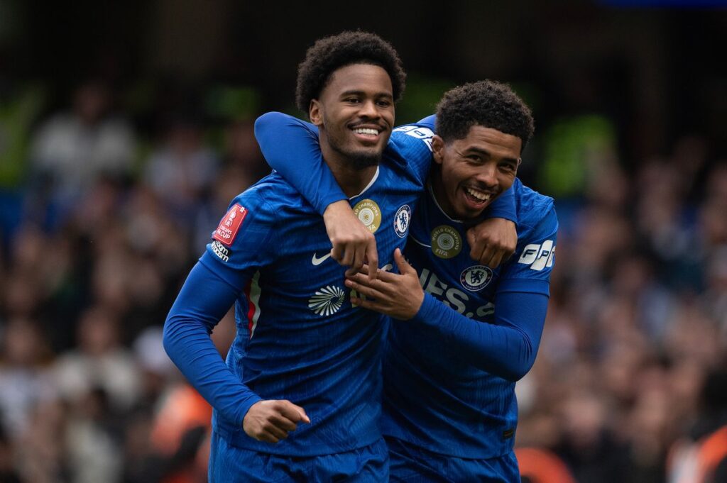 Jorrel Hato of Chelsea (L) celebrates scoring the opening goal with Wesley Fofana (R) during the Emirates FA Cup Quarter Final match between Chelsea and Port Vale on April 4, 2026 in London, England