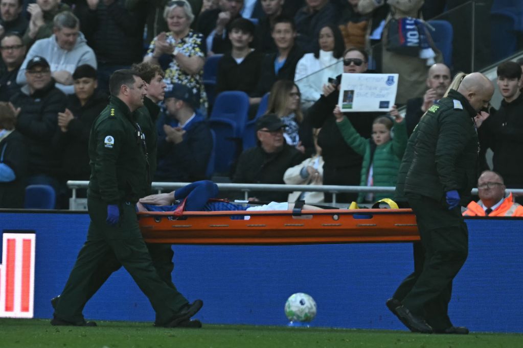 Everton's English defender #32 Jarrad Branthwaite reacts as he leaves on a stretcher during the English Premier League football match between Everton and Liverpool at Hill Dickinson Stadium in Liverpool, north west England on April 19, 2026