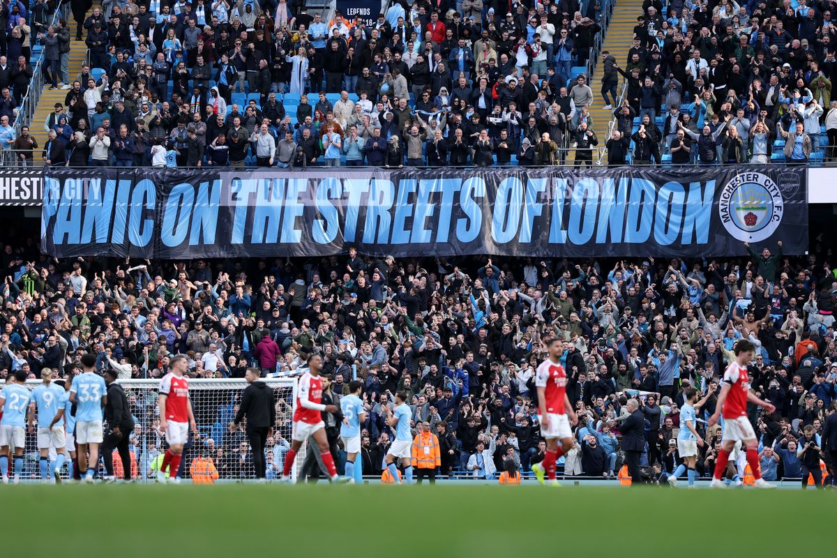 A banner unveiled by Manchester City fans reams 'Panic of the Streets of London' after the Premier League match between Manchester City and Arsenal at Etihad Stadium 