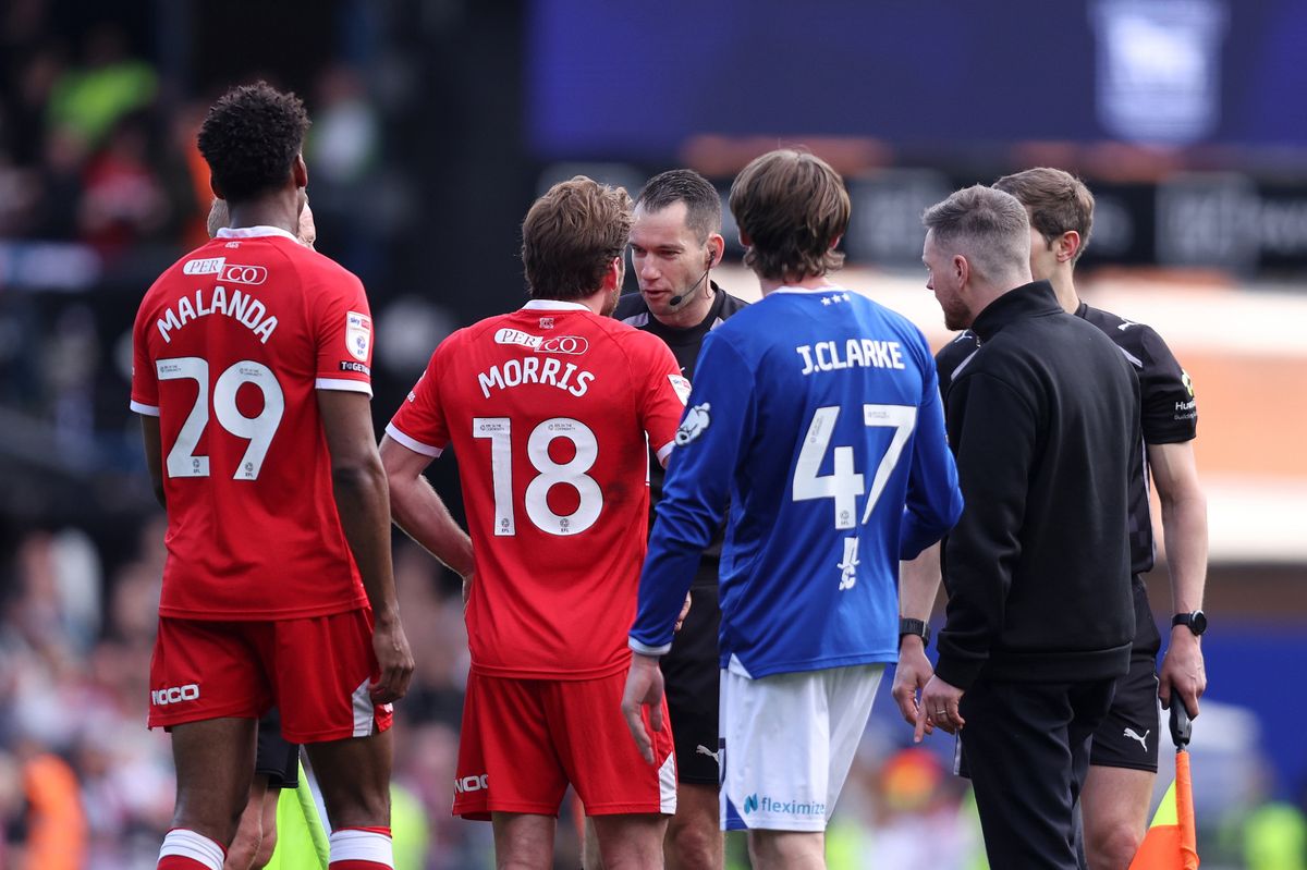 Aidan Morris of Middlesbrough speaks to referee Jarred Gillett following the Sky Bet Championship match between Ipswich Town and Middlesbrough