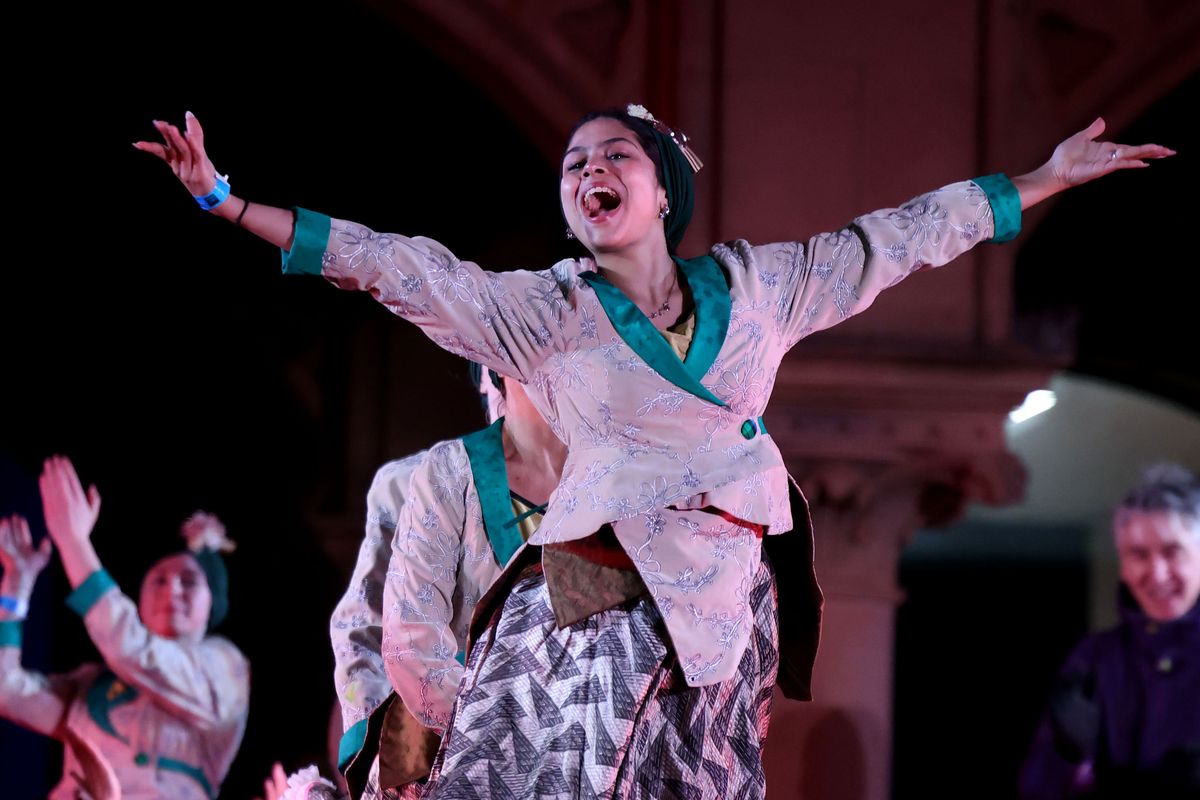 Spectacular open air ballroom Cristal Palace outside The Atkinson in Southport. A woman performing dressed as a Geisha