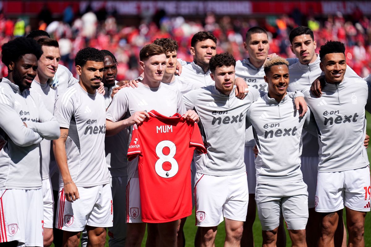 Nottingham Forest's Elliot Anderson holding a shirt in memory of his mum, Helen, pictured ahead of the Premier League match at the City Ground, Nottingham.