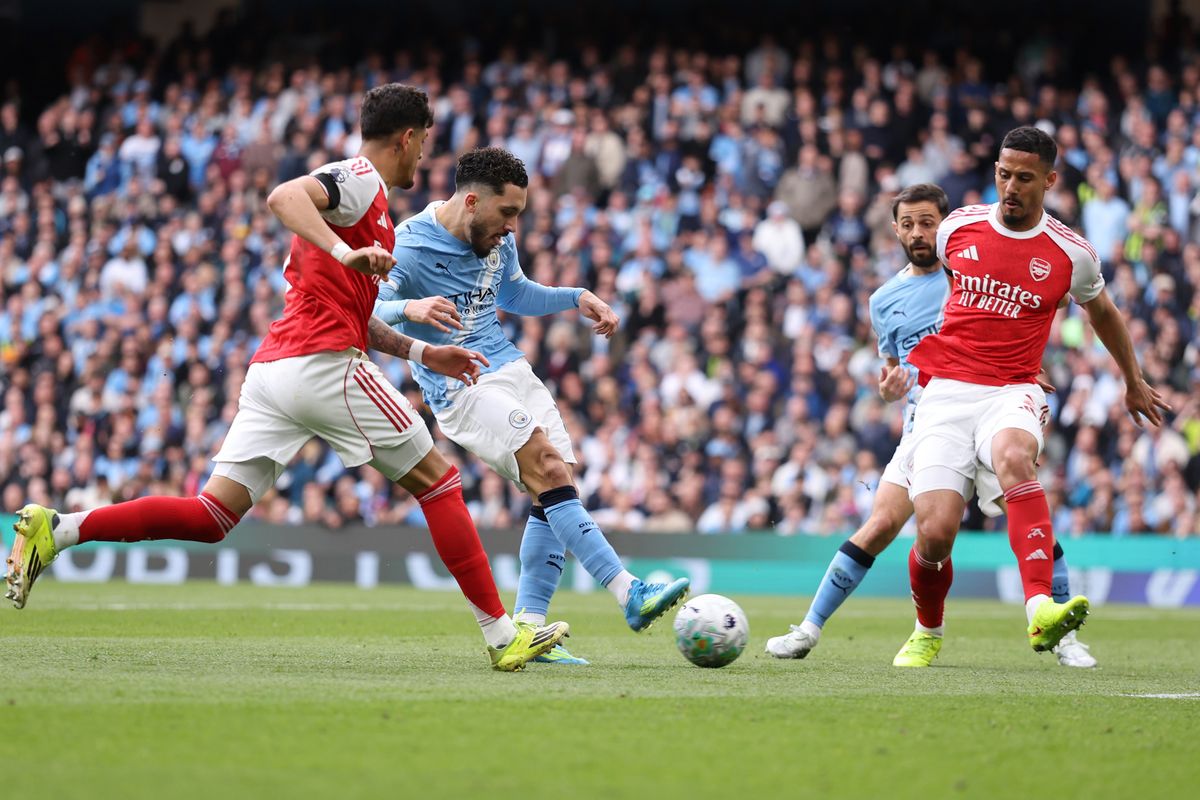 Rayan Cherki scores a goal to make it 1-0 for Manchester City against Arsenal