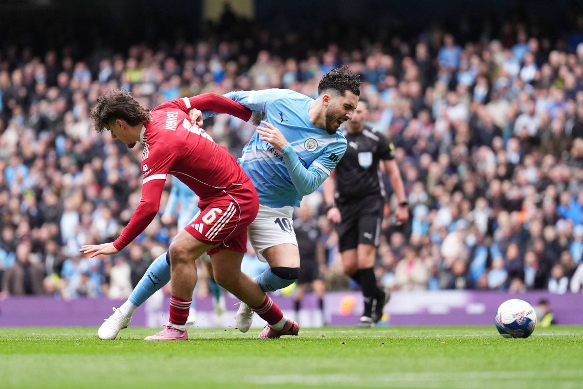 Milso Kerkez and Rayan Cherki collide