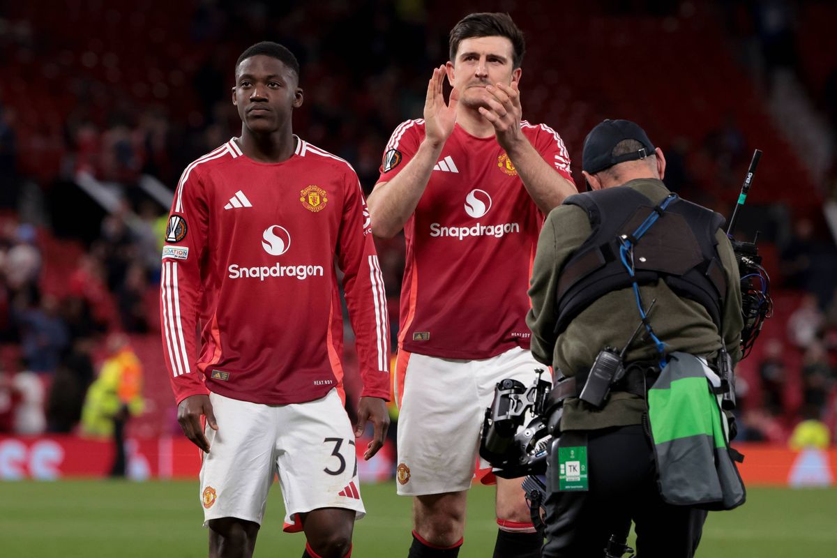 Kobbie Mainoo, Harry Maguire of Manchester United celebrate the victory following the UEFA Europa League 2024/25 Quarter Final Second Leg football match between Manchester United (Man U) and Olympique Lyonnais (OL, Lyon) at Old Trafford