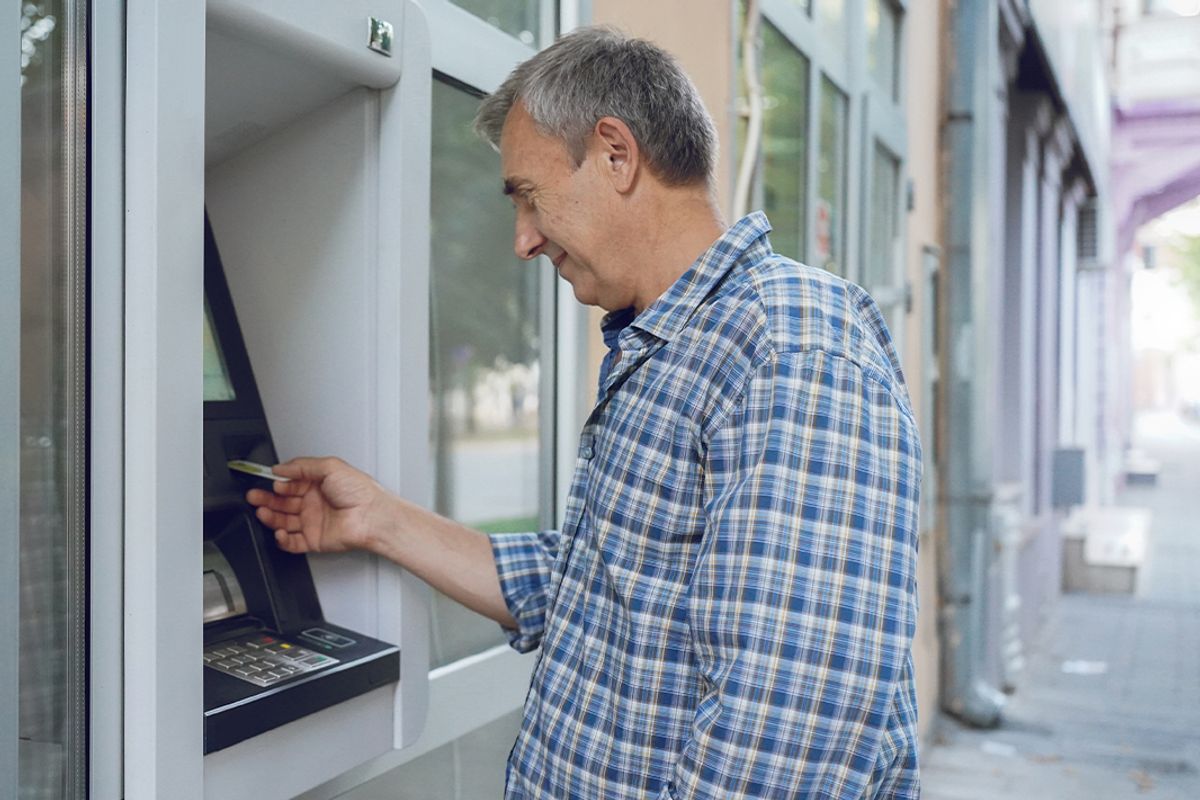 A man checks his bank account