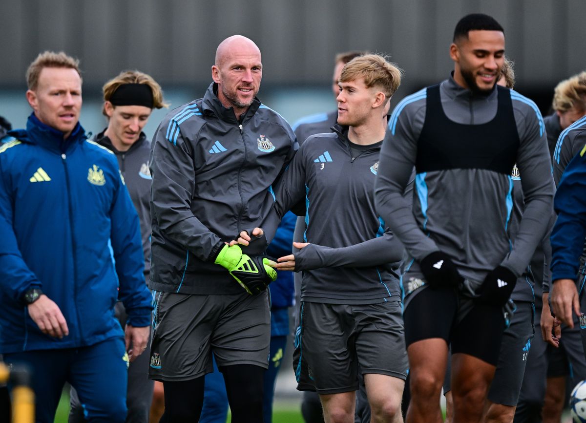 Newcastle United goalkeeper John Ruddy (centre left) and Lewis Hall 