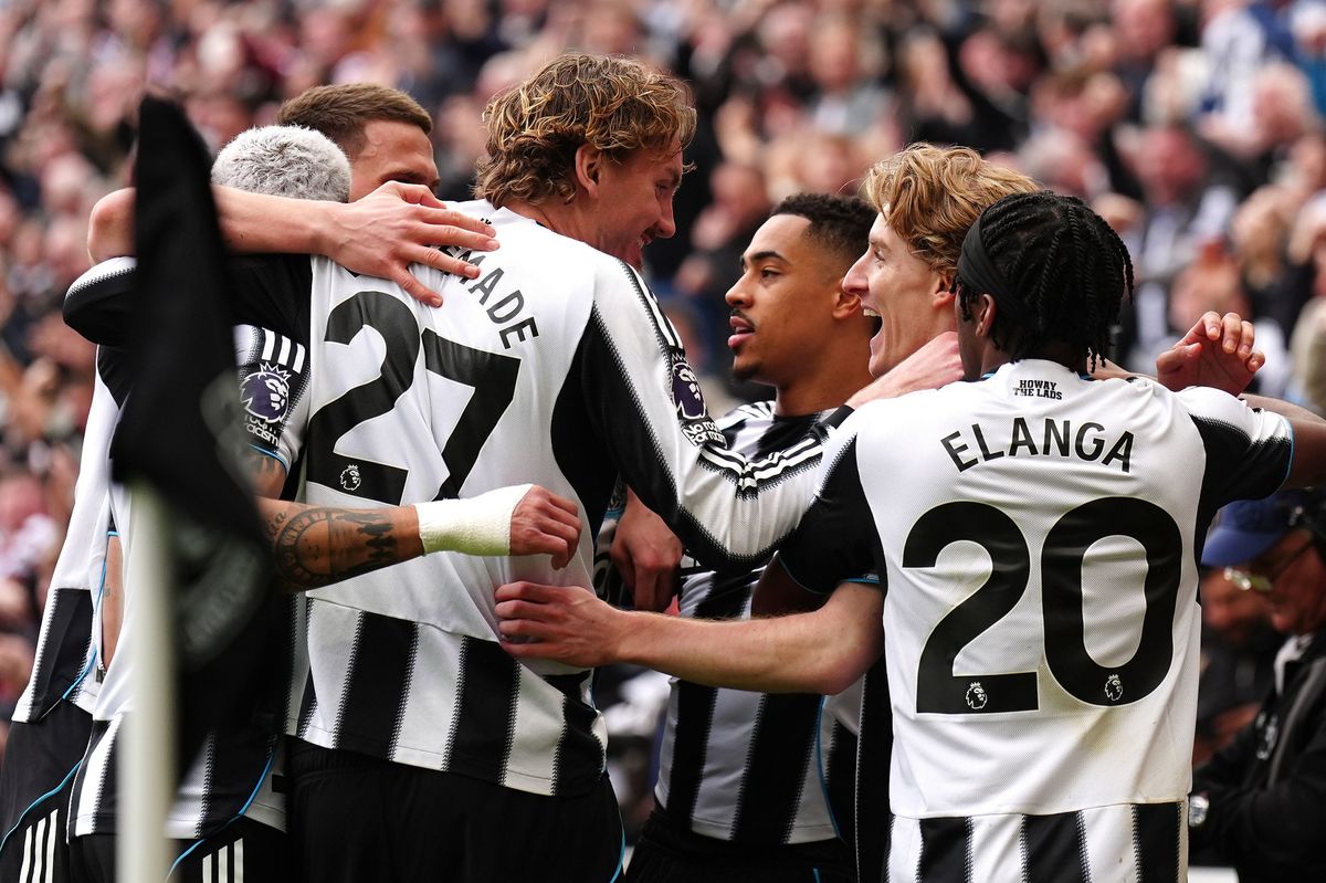 Newcastle United player celebrates with Anthony Gordon