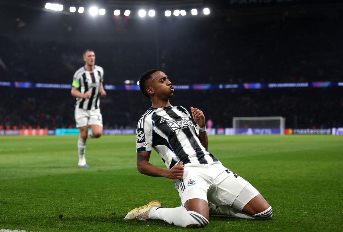 Joe Willock of Newcastle United celebrates scoring against PSG