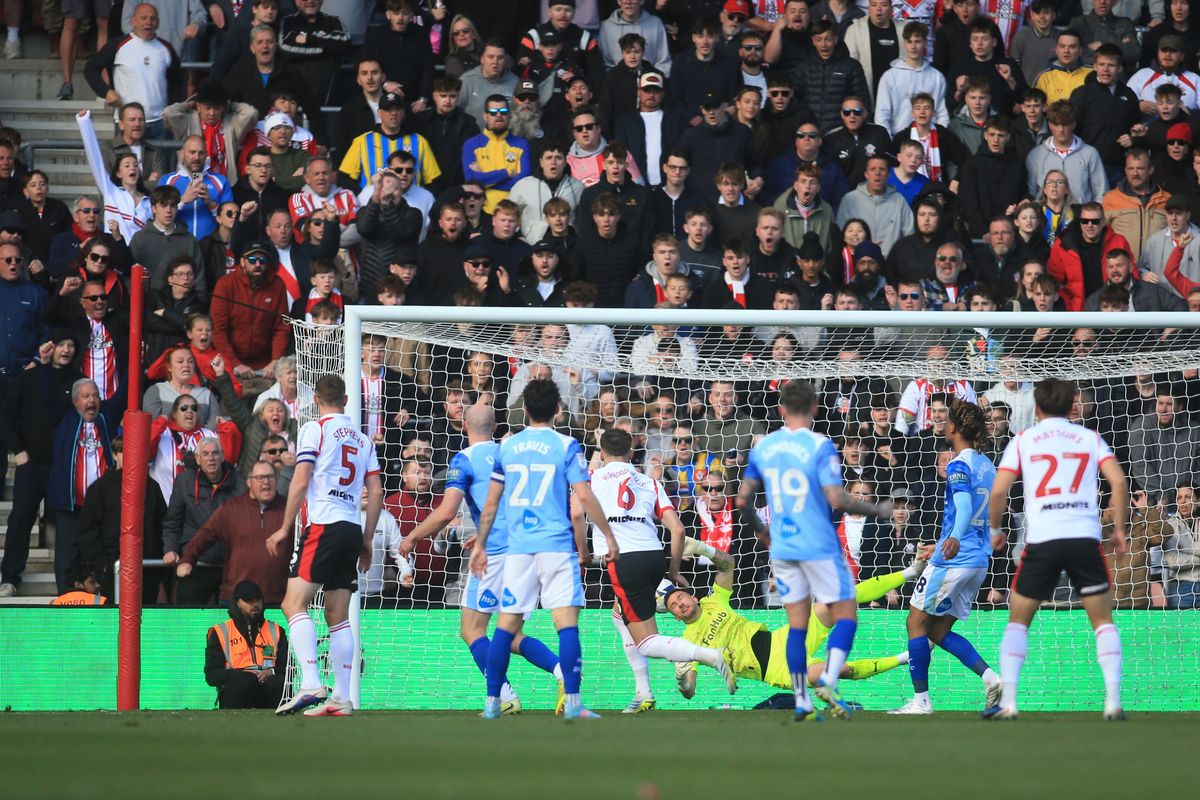 Southampton's Taylor Harwood-Bellis (centre) scores 