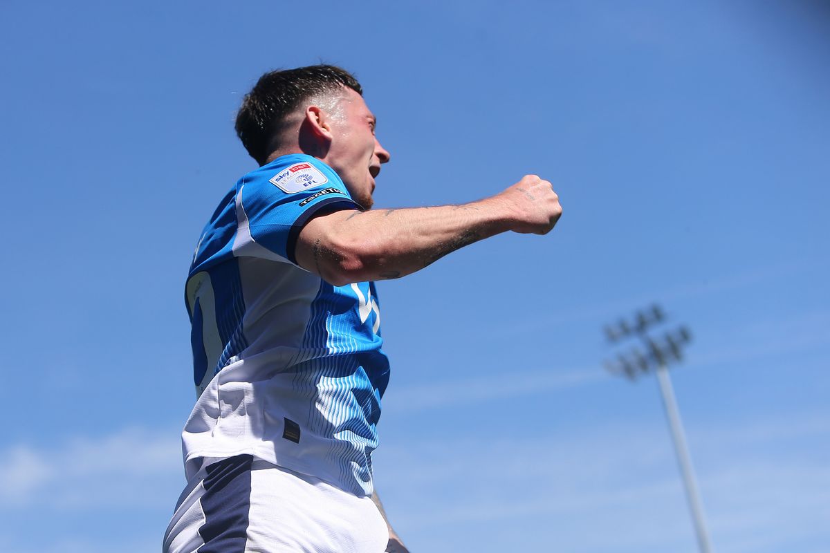 Louie Barry, on loan from Aston Villa, scored a hat-trick to help Stockport beat Peterborough 3-1 in League One.