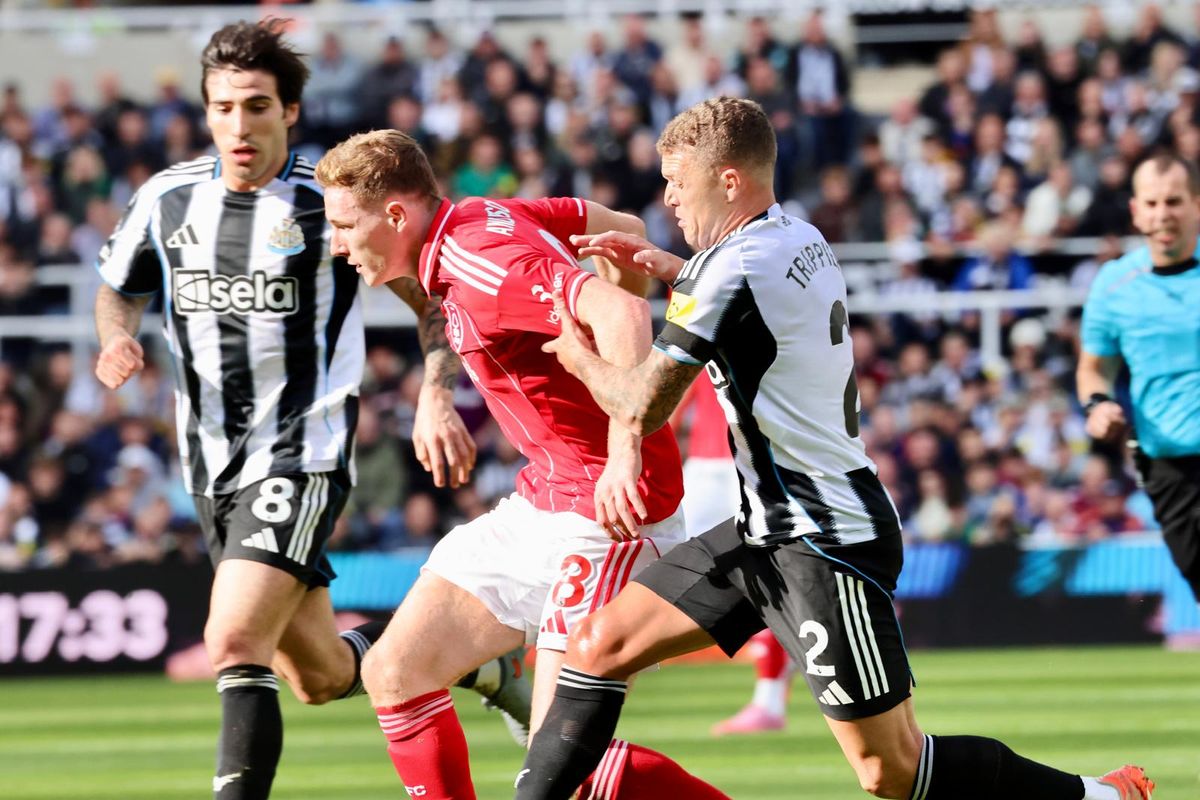 Nottingham Forest star Elliot Anderson tussles with Newcastle pair Sandro Tonali and Kieran Trippier