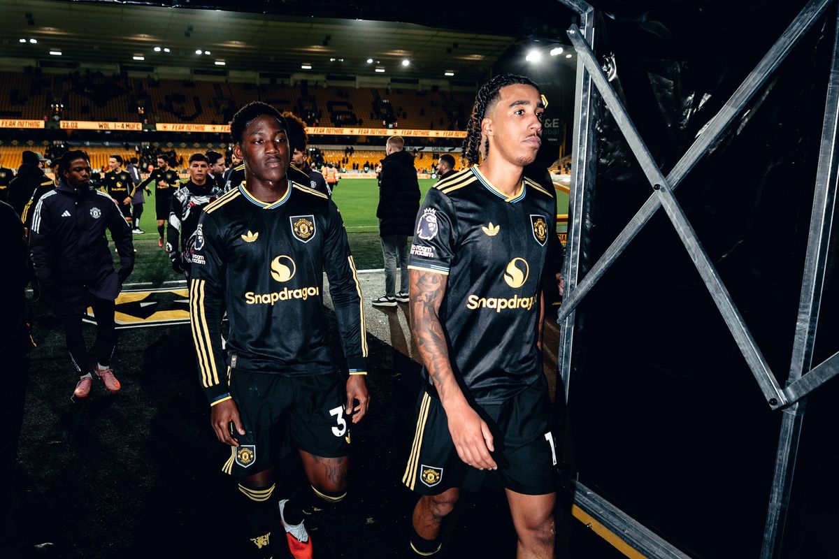 WOLVERHAMPTON, ENGLAND - DECEMBER 08: Kobbie Mainoo, Leny Yoro of Manchester United walks off after the Premier League match between Wolverhampton Wanderers and Manchester United at Molineux on December 08, 2025 in Wolverhampton, England. (Photo by Zohaib Alam - MUFC/Manchester United via Getty Images)