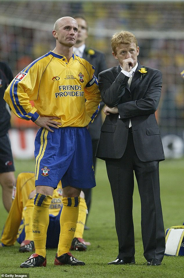 2003 manager Gordon Strachan with captain Chris Marsden after the defeat by Arsenal at the Millennium Stadium