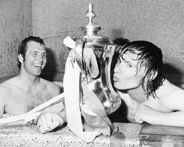 Goalscorer Bobby Stokes (right) kisses the cup after the 1976 final