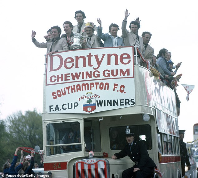 The 1976 team parade through the streets to celebrate winning the only major trophy in the club's history
