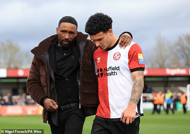 Defoe was supported in the stands by one of his coaching mentors in Chris Hughton, who was sandwiched between Woking’s owner Todd Johnson and managing director Robin Byrne