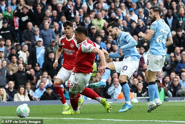 Rayan Cherki scores the opening goal against Arsenal on Sunday. The Frenchman has been given a run in the team in the No 10 position and it is paying off