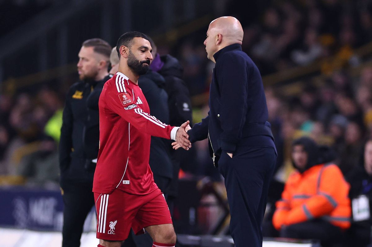 Mohamed Salah of Liverpool and Arne Slot manager / head coach of Liverpool as he comes off during the Emirates FA Cup Fifth Round match between Wolverhampton Wanderers