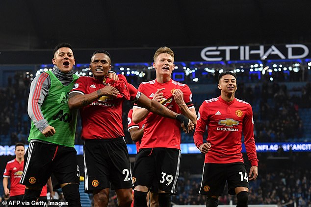Non league side Wythenshawe FC Vets have completed the signing for Manchester United icon Antonio Valencia (second left)
