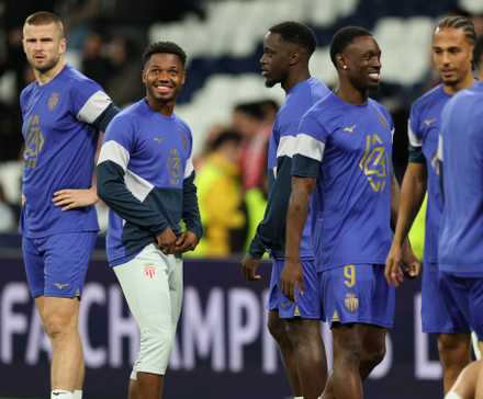 AS Monaco's Eric Dier and Ansu Fati during the warm up before the match