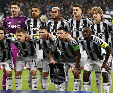 Newcastle United players pose for a team group photo before the match 
