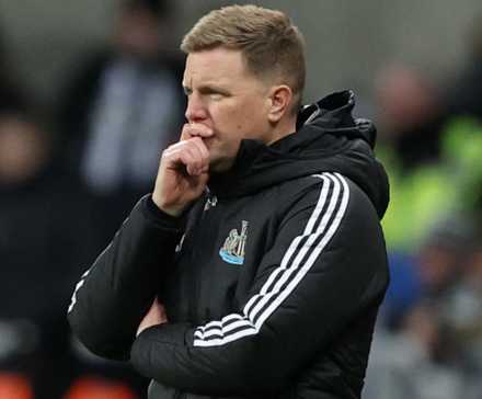 Newcastle United manager Eddie Howe puts his hand to his face.