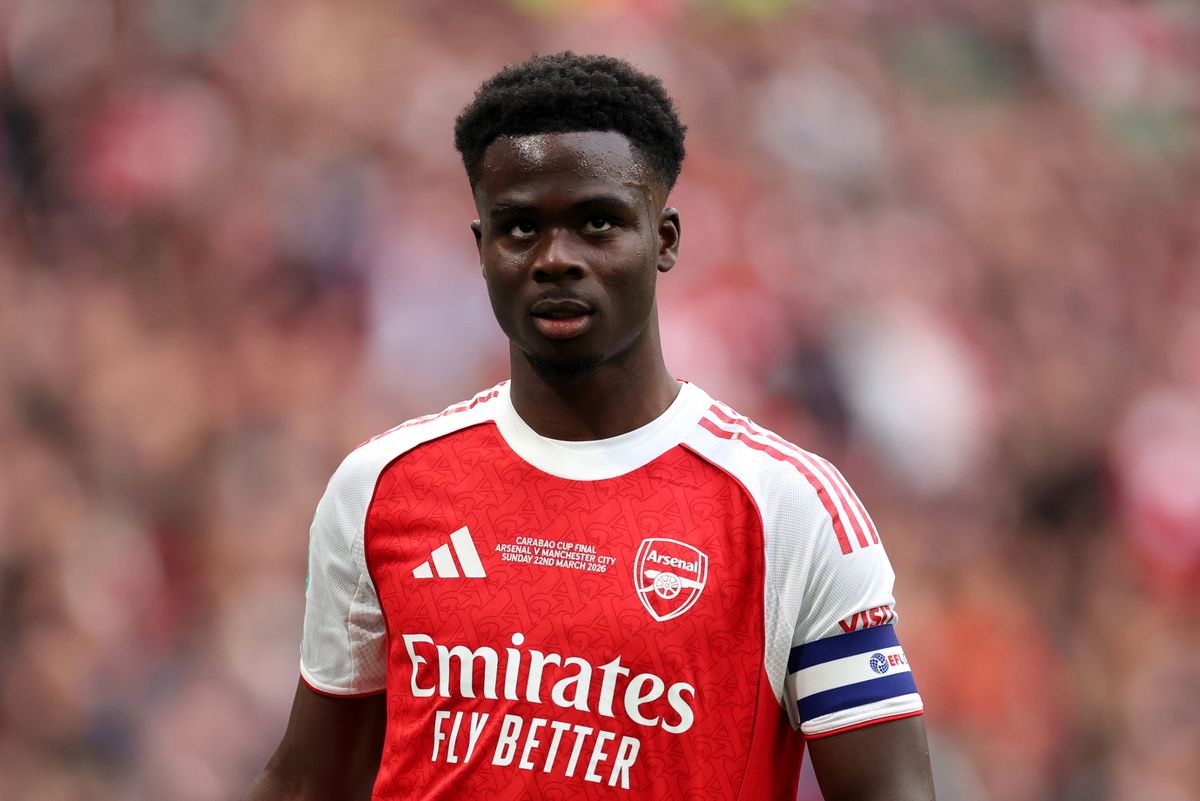 Bukayo Saka of Arsenal looks on