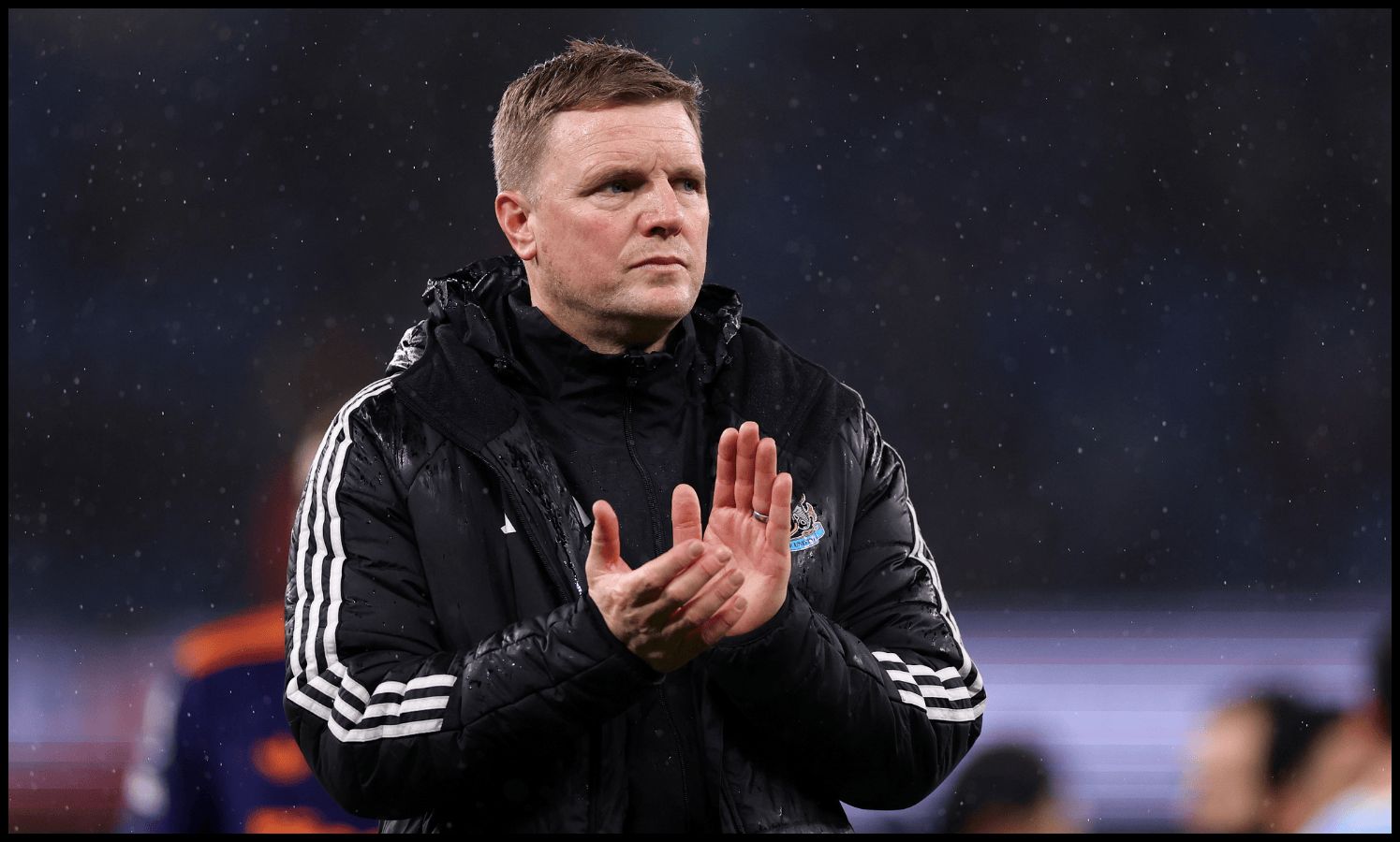 MANCHESTER, ENGLAND - FEBRUARY 21: Eddie Howe, Manager of Newcastle United, applauds the fans after the team's defeat in the Premier League match between Manchester City and Newcastle United at Etihad Stadium on February 21, 2026 in Manchester, England.