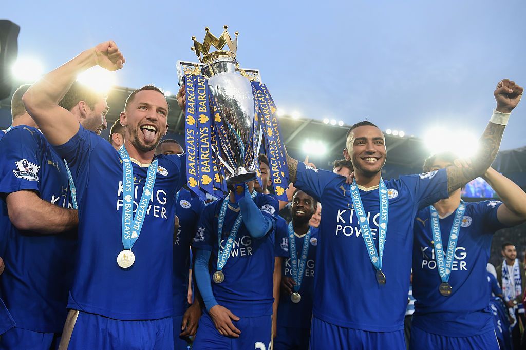 Danny Drinkwater and Danny Simpson of Leicester City pose with Premier League Trophy on May 7, 2016 in Leicester, United Kingdom