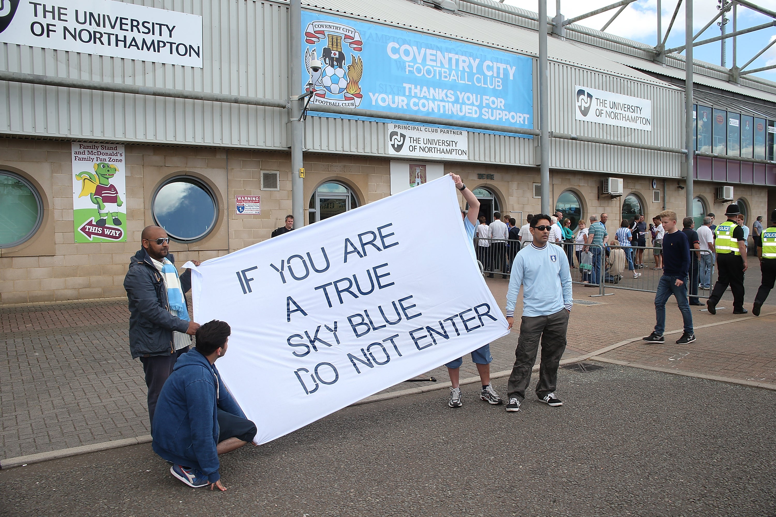 Coventry fans protest before a 'home' match at Sixfields Stadium, Northampton, while down in League One in 2013