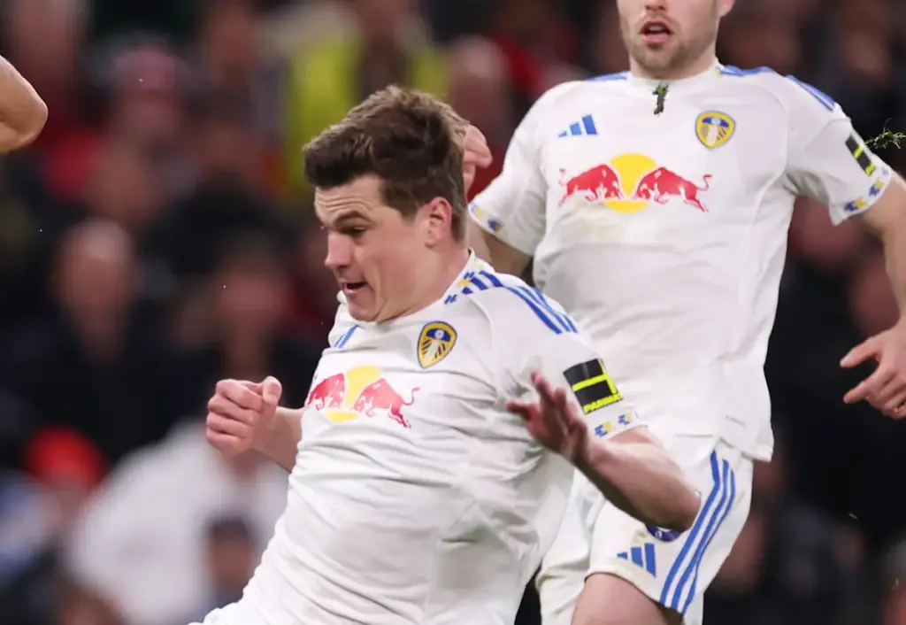 Jaka Bijol battles for the ball while playing for Leeds United