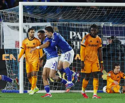  Como's Diego Carlos celebrates scoring their second goal with Anastasios Douvikas, Jacobo Ramon and Ivan Smolcic