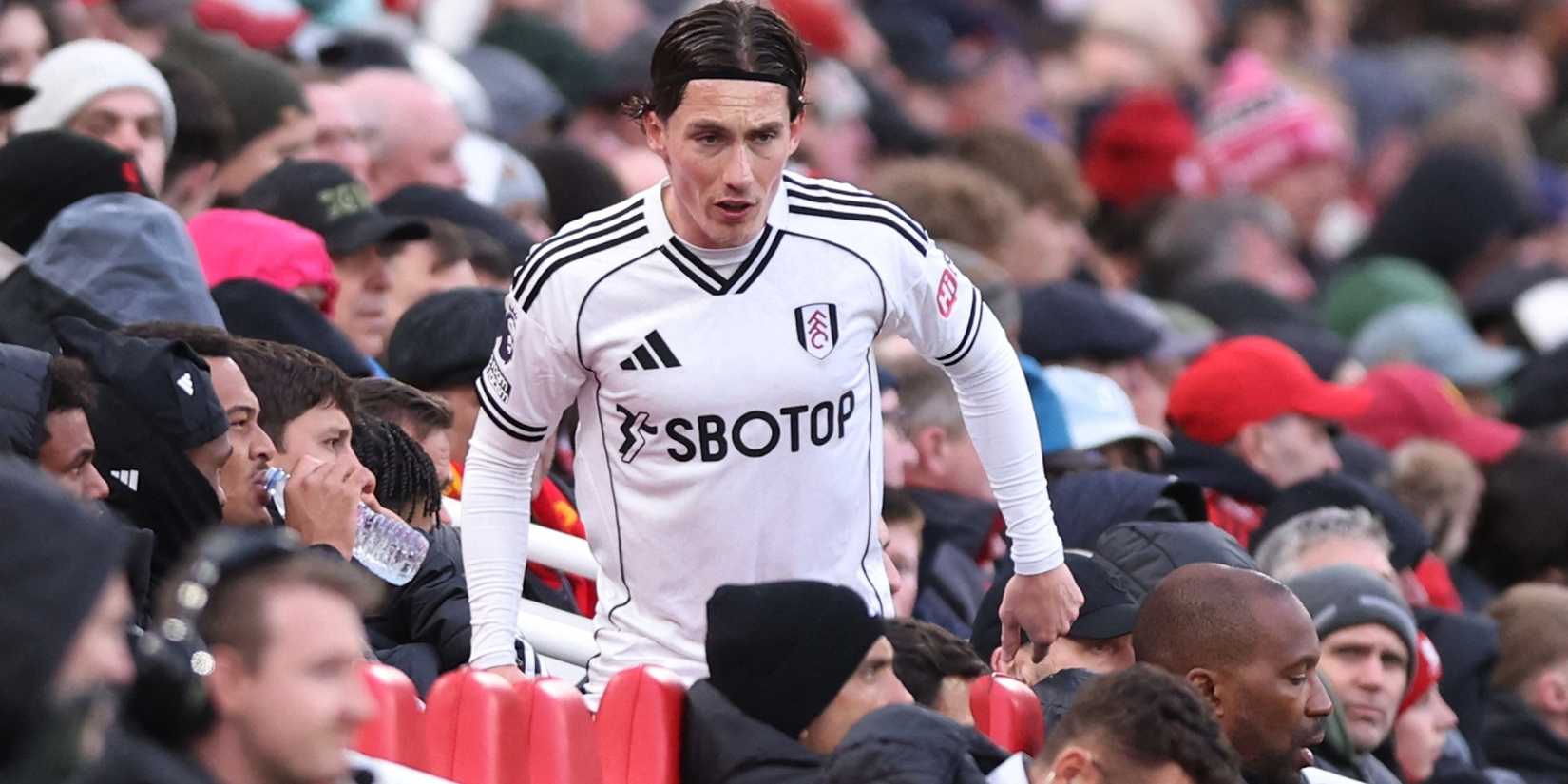 Fulham's Harry Wilson reacts on the bench after he is substituted