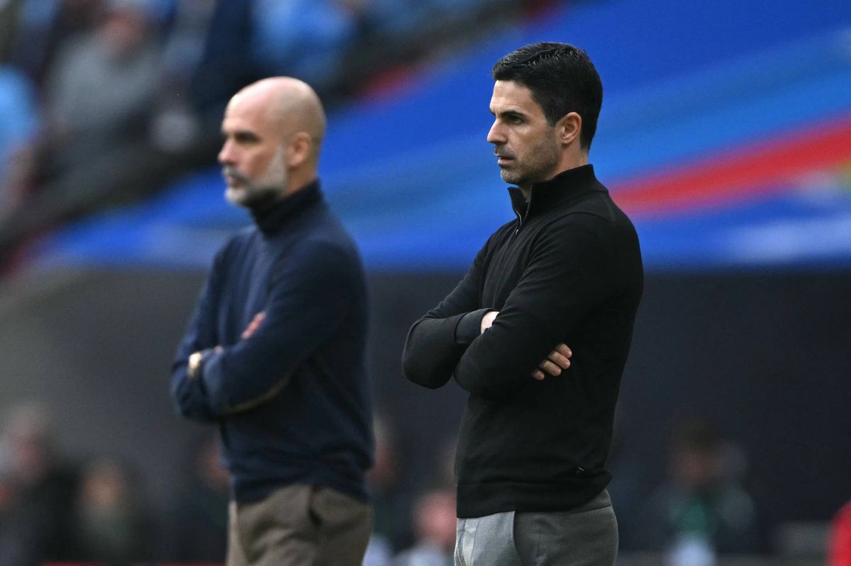 Manchester City's Spanish manager Pep Guardiola (L) and Arsenal's Spanish manager Mikel Arteta (R) look on from the tuochline during the English League Cup final football match between Arsenal and Manchester City