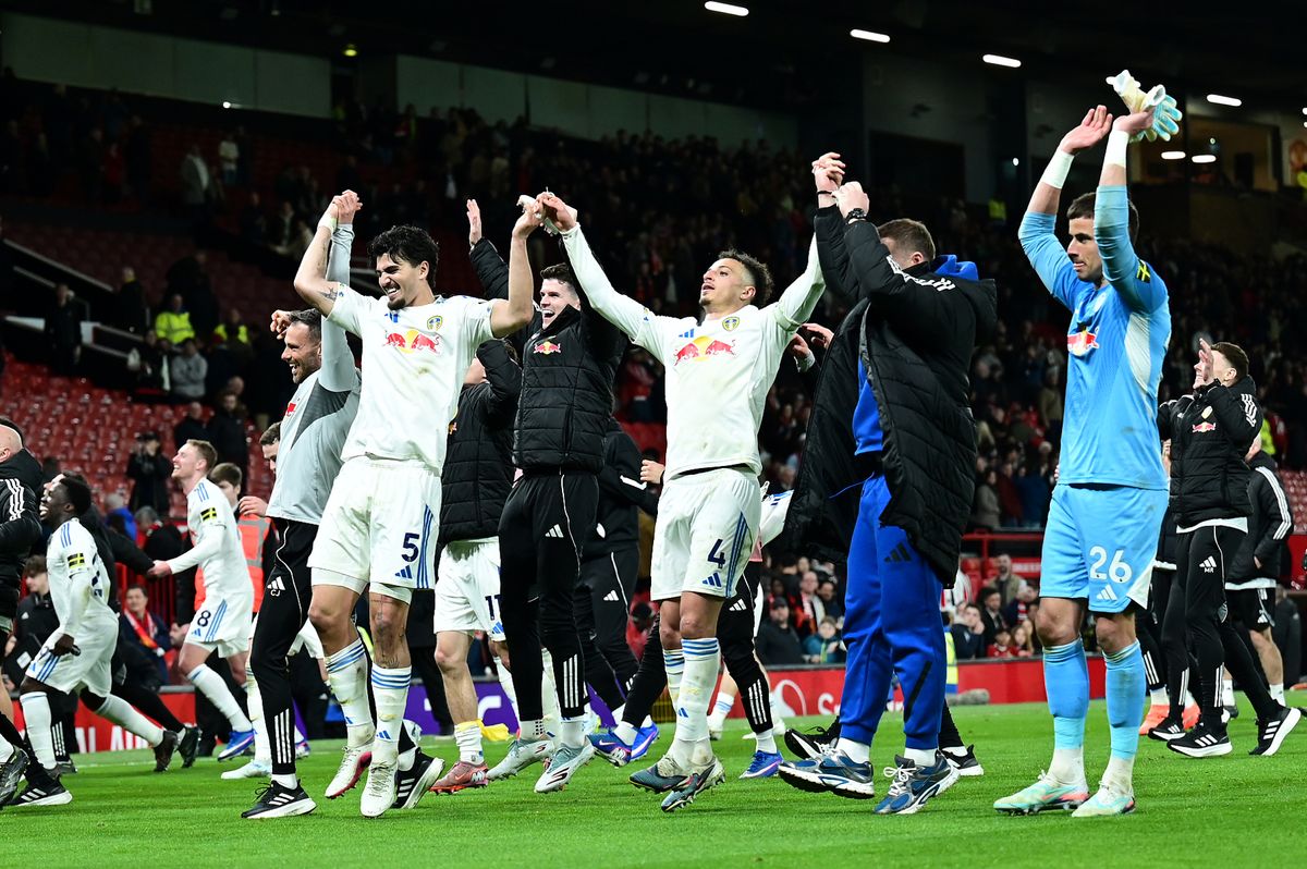 Leeds United celebrate at the end of the Premier League match between Manchester United and Leeds United at Old Trafford. 