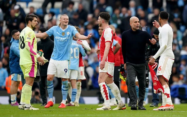 Gabriel, extreme right, and Erling Haaland, second left, are separated after Manchester City and Arsenal's fixture in March 2024