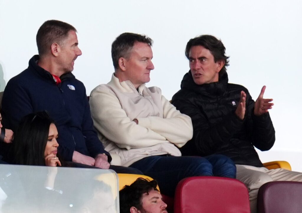 Former Brentford and Tottenham manger Thomas Frank in the stands alongside