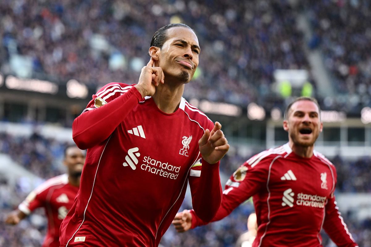 Virgil van Dijk celebrates after scoring Liverpool's winner against Everton