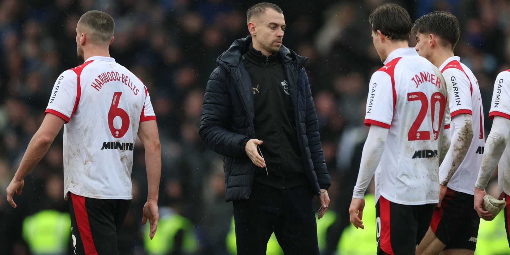 Southampton manager Tonda Eckert congratulates his players