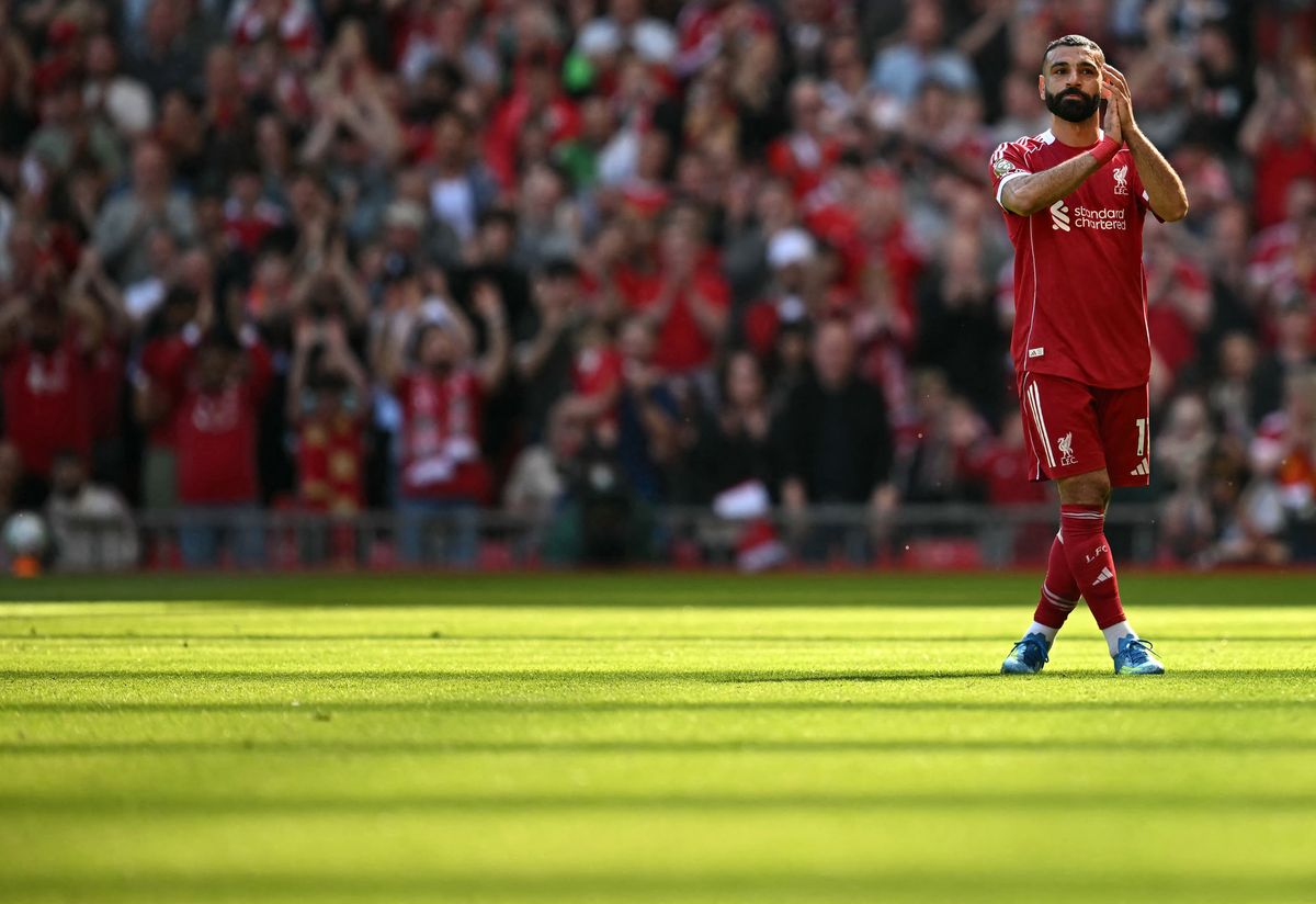 Liverpool's Egyptian striker #11 Mohamed Salah applauds the fans as he leaves the pitch injured during the English Premier League football match between Liverpool and Crystal Palace at Anfield in Liverpool, north west England on April 25, 2026