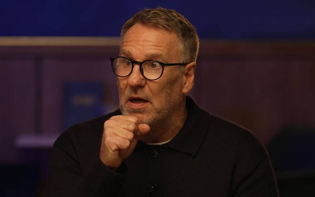 Paul Merson looks on