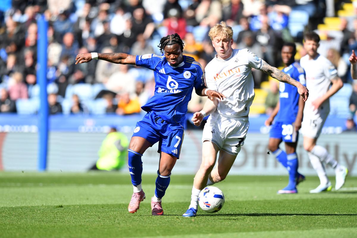 Abdul Fatawu Leicester City with Melker Widell of Swansea City